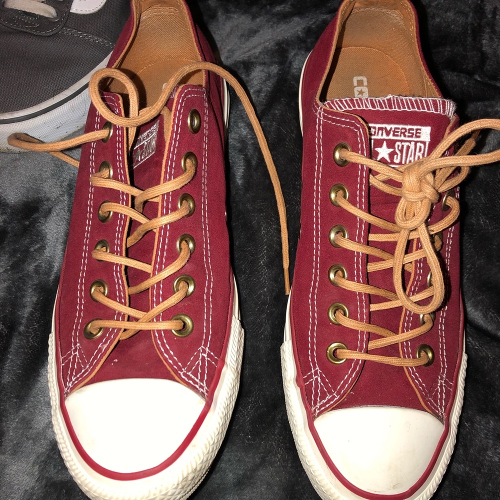 burgundy converse and black converse , 30 each